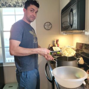 justin making cheese at home