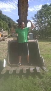 flexing in a big excavator bucket